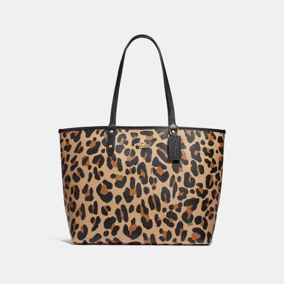 Coach Handbags - 🐆Coach Reversible City Tote Animal Print/black